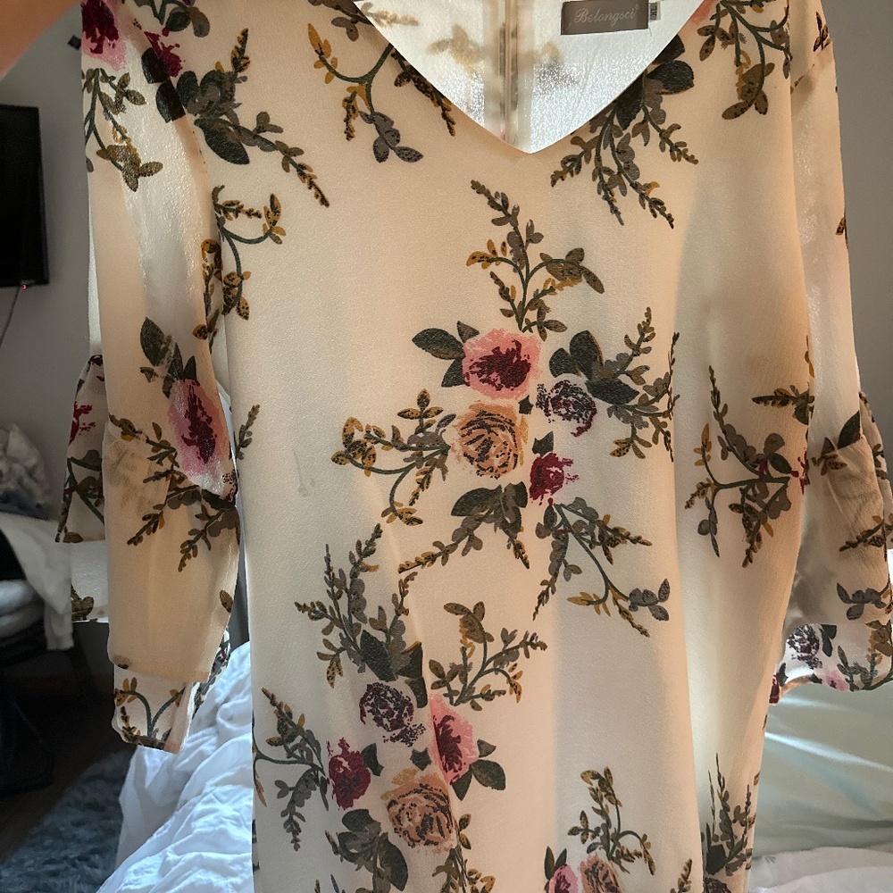 White and floral dress.